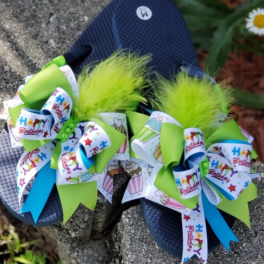 Comfortable themed designed flip flops.